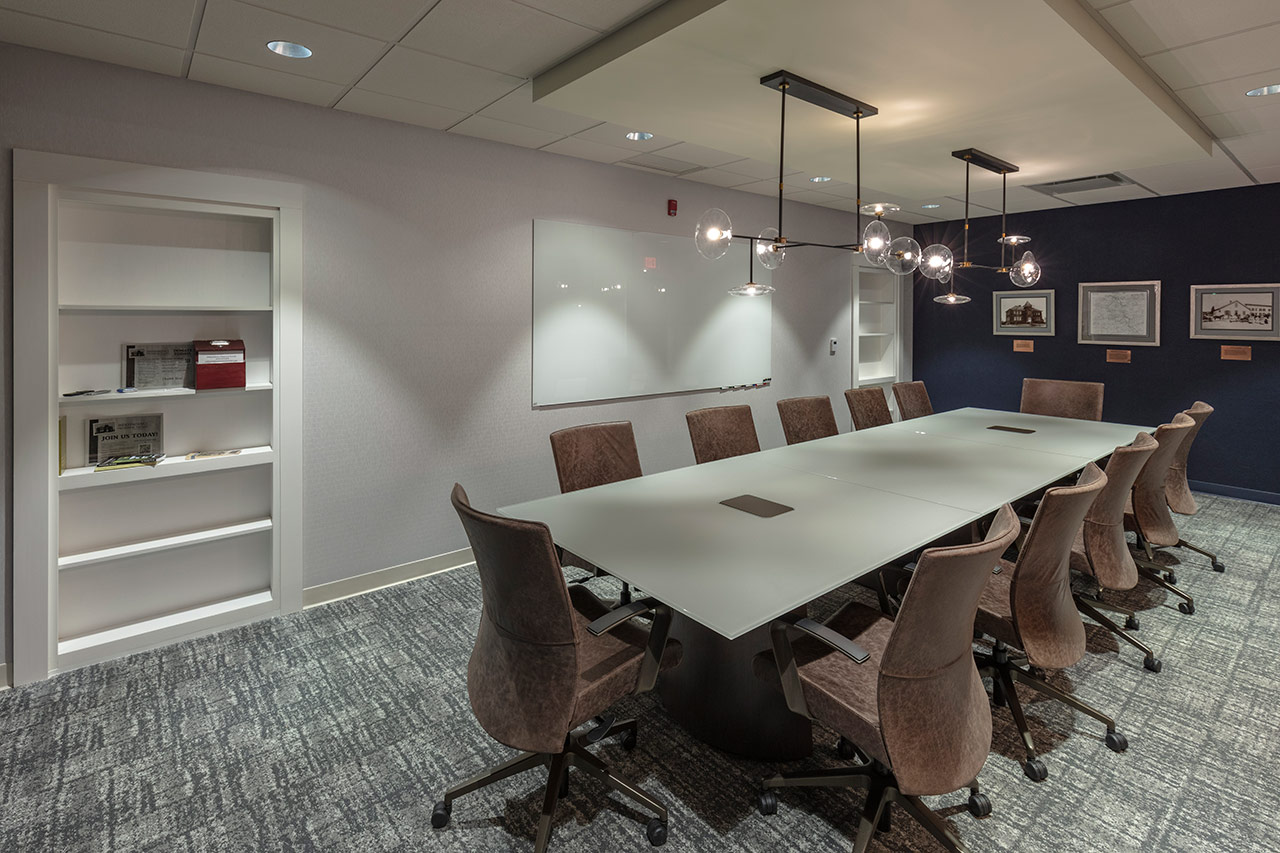 Conference room for 12 and whiteboard